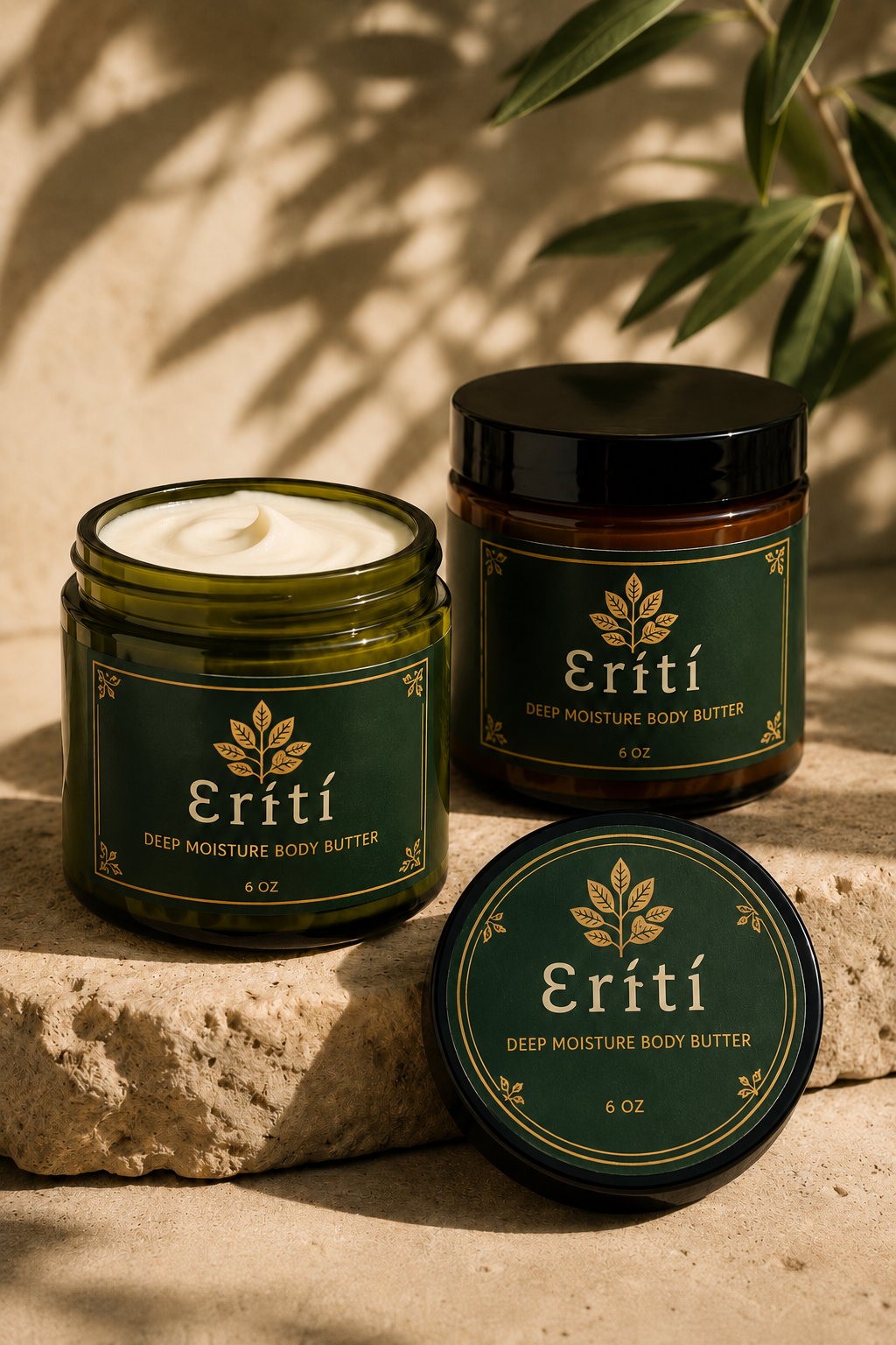 Ɛrɨ́tí Deep Moisture Body Butter in olive green and amber glass jars